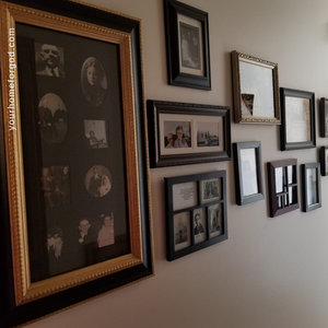 How to Decorate to Proclaim What God Has Done For You with a wall of family photos!